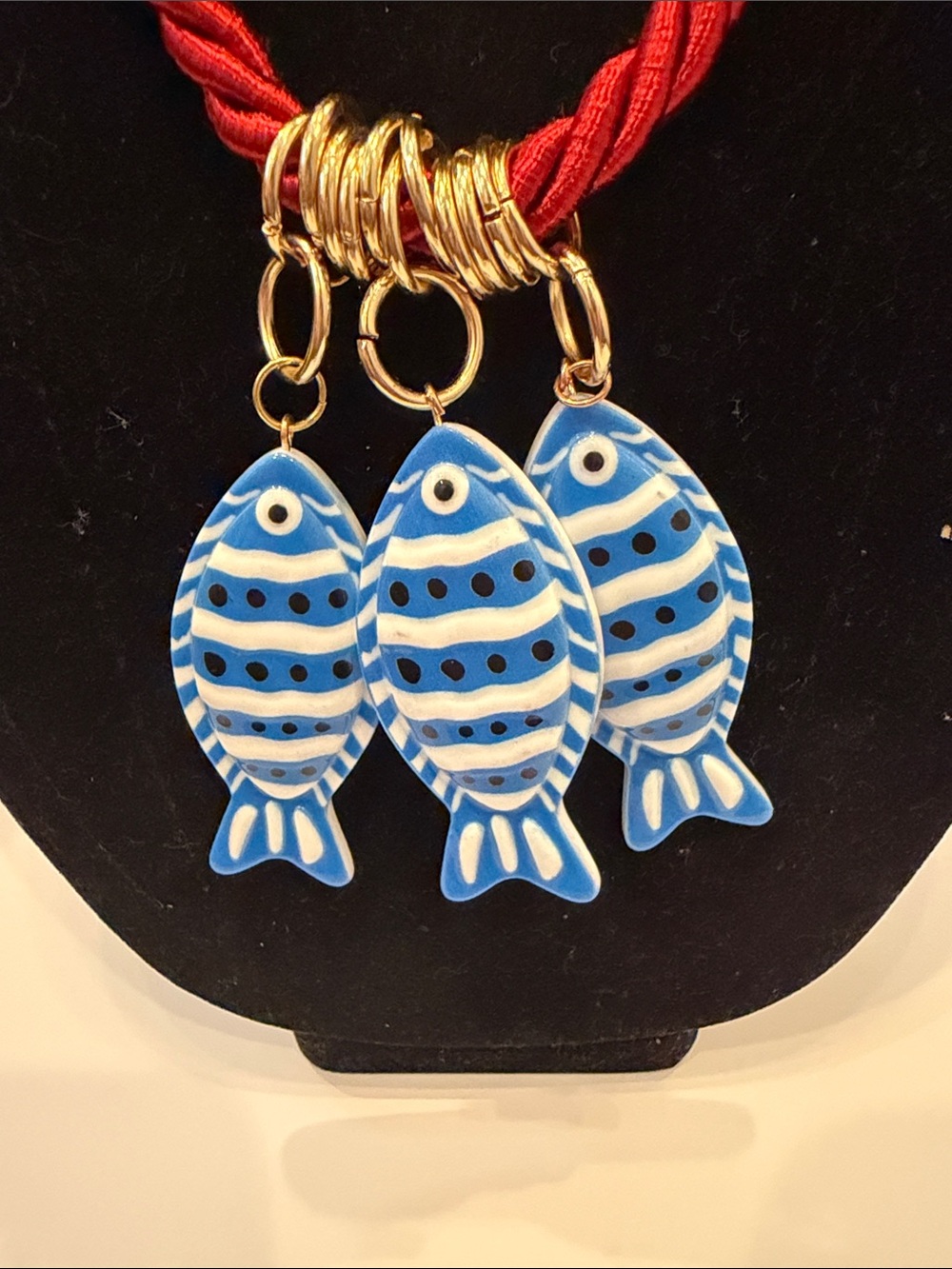 Women’s Red Rope Necklace with Blue Fish Charms